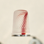 Silent languages, Chapter 4: Family history, installation MusVerre, Sars-Poteries, detail, pâte de verre, stainless steel, magnets, 2021-2022, 2,3 x 1,8 x 1,8 cm (photo: Philippe Robin)