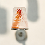 Silent languages, Chapter 4: Family history, installation MusVerre, Sars-Poteries, detail, pâte de verre, stainless steel, magnets, 2021-2022, 2 x 1,8 x 1,8 cm (photo: Philippe Robin)