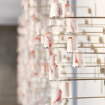 Silent languages, Chapter 4: Family history, installation MusVerre, Sars-Poteries, detail, pâte de verre, stainless steel, magnets, 2021-2022 (photo: Philippe Robin)